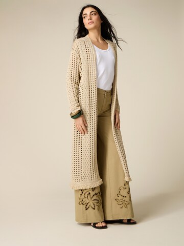 Cappotto in maglia di oltre in oro: frontale