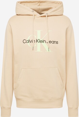 Sweat-shirt Calvin Klein Jeans en beige : devant