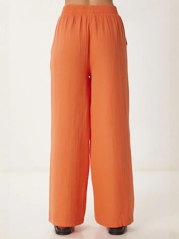Happiness İstanbul Wide leg Broek in Oranje