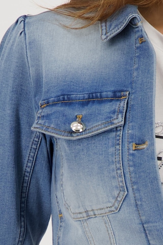 Geacă de primăvară-toamnă de la monari pe albastru