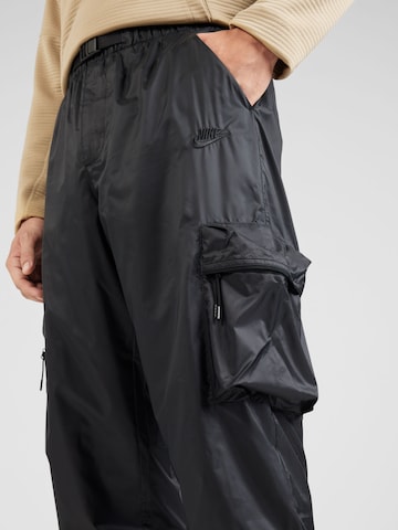 Effilé Pantalon cargo Nike Sportswear en noir