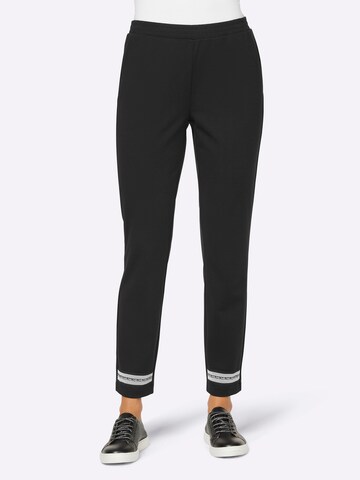 Coupe slim Pantalon heine en noir : devant