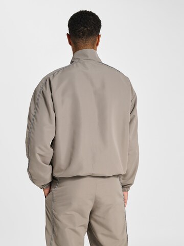 Veste de sport 'Loose Track' Hummel en gris