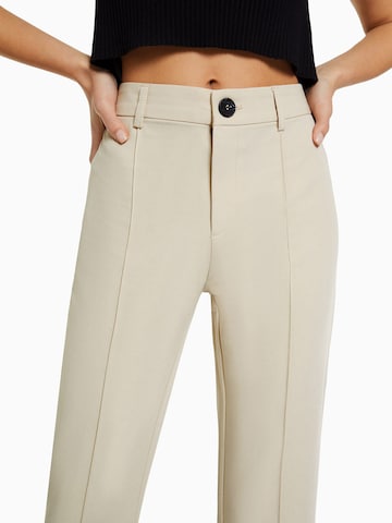 Bershka Flared Hose in Beige