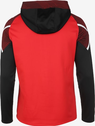 Veste de survêtement JAKO en rouge