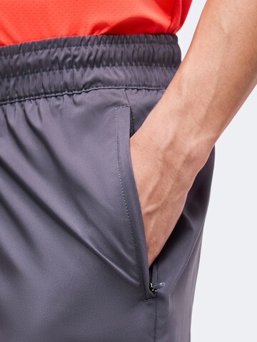 PUMA Regular Sporthose 'TAD FOUNDATIONS' in Grau