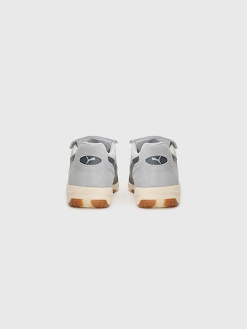 Baskets basses 'King' PUMA en gris