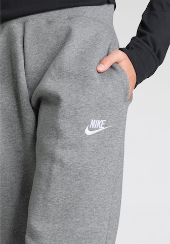 Nike Sportswear Tapered Trousers in Grey