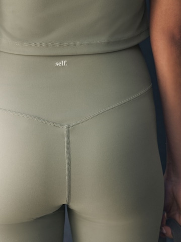 Skinny Leggings self. en vert