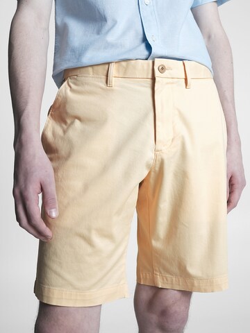 TOMMY HILFIGER Regular Chino trousers 'Harlem' in Yellow: front