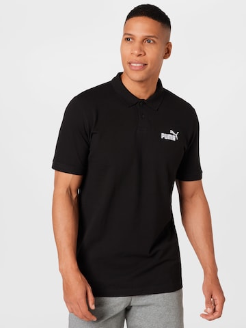 PUMA Poloshirt in Schwarz: predná strana