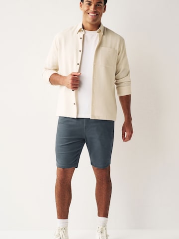 regular Pantaloni chino di Next in blu