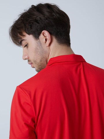 T-Shirt fonctionnel 'Polo' SPORTKIND en rouge