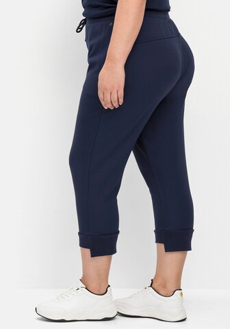 SHEEGO Slimfit Sportbroek in Blauw