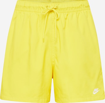 Regular Pantalon 'Club' Nike Sportswear en jaune : devant