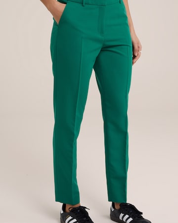 Coupe slim Pantalon à plis WE Fashion en vert : devant