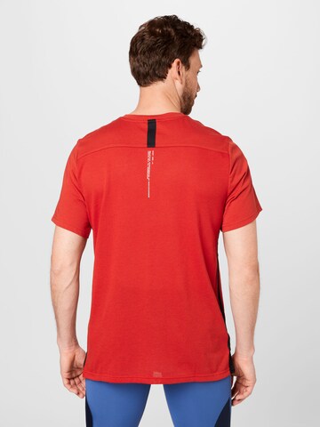 NIKE - Camiseta funcional en rojo