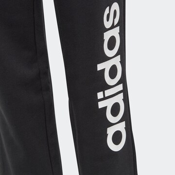 ADIDAS SPORTSWEAR Tapered Sports trousers 'Essentials Linear Logo' in Black