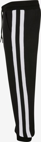 Tapered Pantaloni di Urban Classics in nero