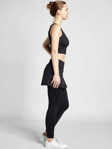 SPORTKIND - regular Pantalón deportivo '2-in-1 Skirt' en negro