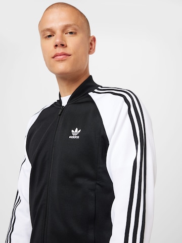 ADIDAS ORIGINALS Zip-Up Hoodie 'Adicolor Classics SST' in Black | ABOUT YOU