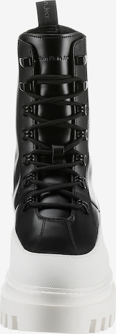 juoda Calvin Klein Suvarstomieji kulkšnis dengiantys batai