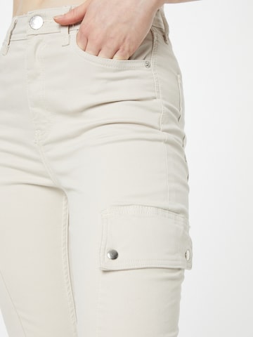 Skinny Jeans cargo 'LOUIS' di River Island in beige
