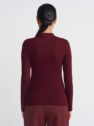 Maglietta di Dilvin in rosso