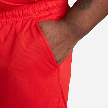 Nike Sportswear Regular Workout Pants in Red