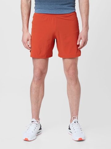 UNDER ARMOUR Regular Workout Pants 'SpeedPocket' in Orange: front