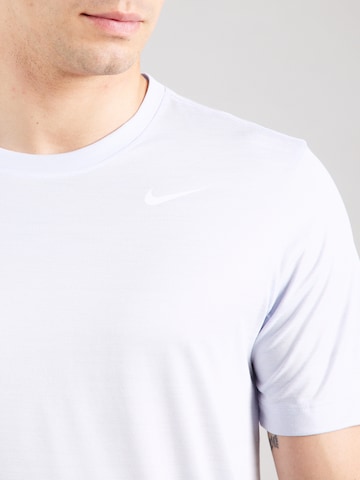 NIKE Toiminnallinen paita värissä harmaa