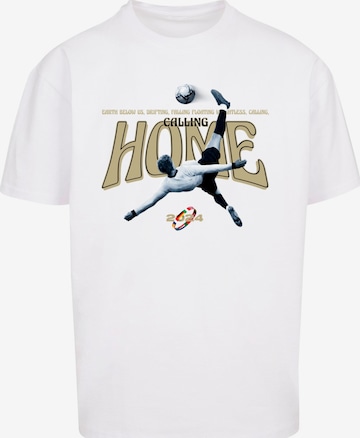 MT Upscale - Camiseta 'Calling Home' en blanco: frente