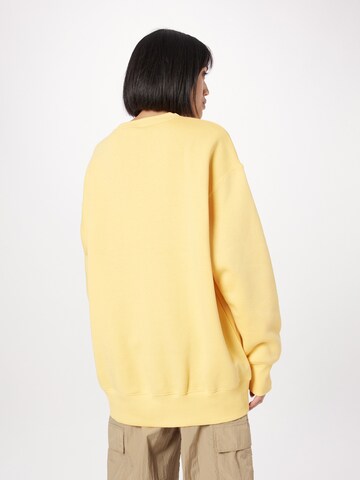 Sweat-shirt 'Phoenix Fleece' Nike Sportswear en jaune