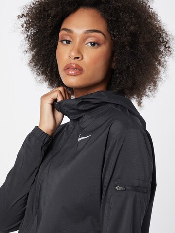 NIKE Sportjacka i svart