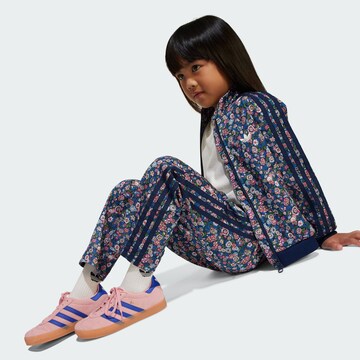 ADIDAS ORIGINALS Joggingpak 'Adidas Originals x Liberty London Firebird' in Blauw