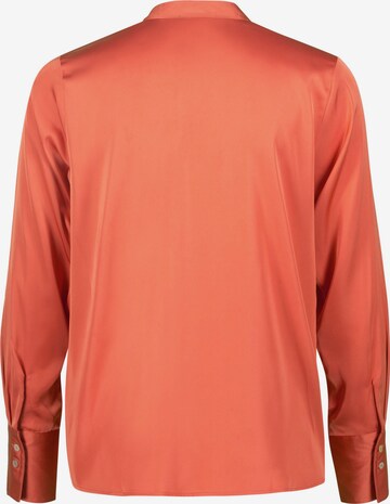 Camicia da donna di zero in arancione