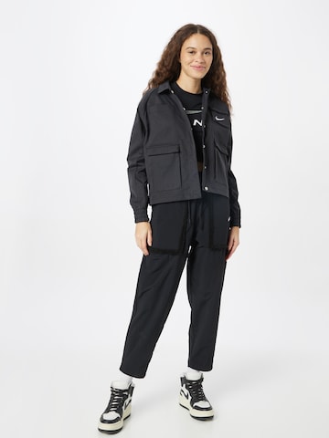 Nike Sportswear Дънки Tapered Leg Панталон в черно