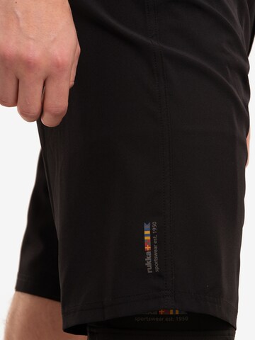 Regular Pantalon de sport 'Rainio' Rukka en noir