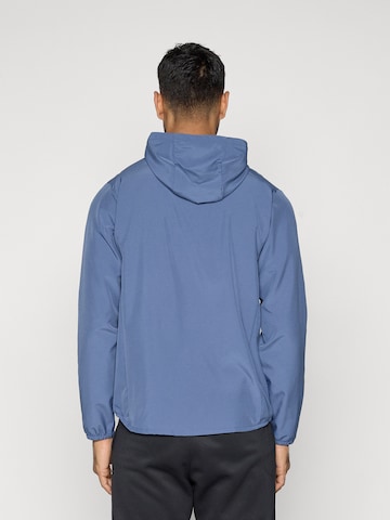 NIKE Trainingsjack 'Form' in Blauw