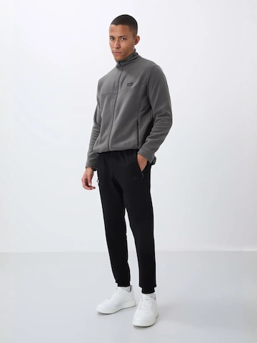 Regular Pantalon de sport Tommy Life en noir