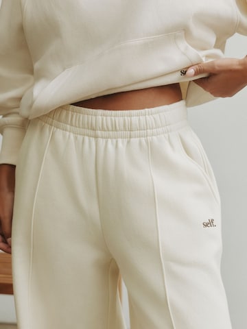 smėlio self. Plačios klešnės Kelnės