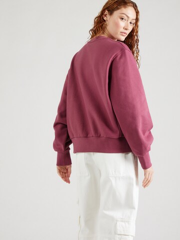Sweat-shirt 'American Script' Carhartt WIP en rose