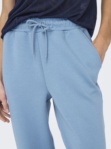 Effilé Pantalon de sport ONLY PLAY en bleu