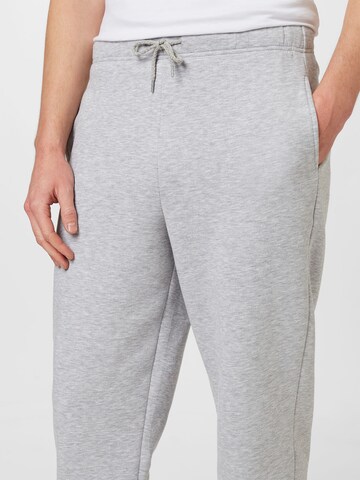 ABOUT YOU Tapered Trousers 'Jake' in Grey