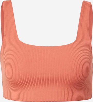 Bustier Soutien-gorge de sport 'TOMMY' Girlfriend Collective en orange : devant