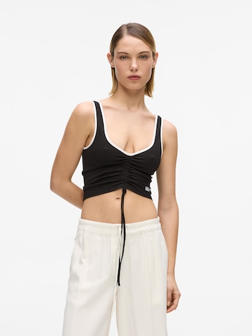 KARL LAGERFELD JEANS - Top en negro: frente