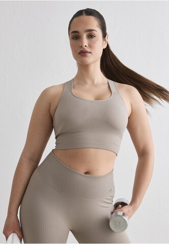 Bustino Reggiseno sportivo di Aim'n in beige: frontale