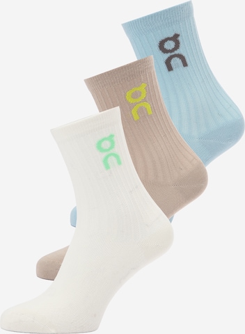 On Sokker i beige: forside