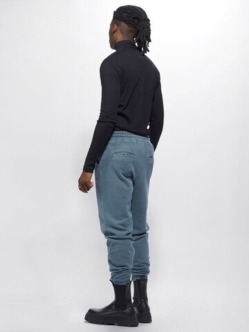 Young Poets Tapered Trousers 'Maleo' in Blue