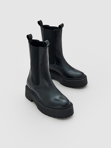 Bottines 'Gudrun' EDITED en noir